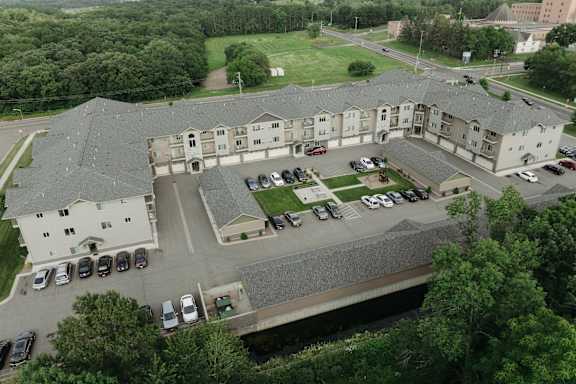 arial view of a building and parking lot