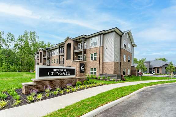 A building with a sign that says "Retreat at Citygate".