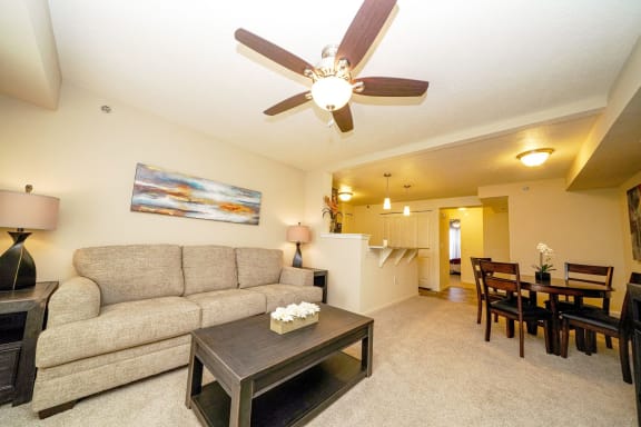a living room with a couch and a table at Andover Pointe Apartment Homes, La Vista, 68138