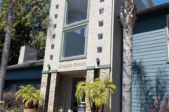 A building with a leasing office sign in front of it at Autumn Oaks Apartments, Roseville, CA, 95678