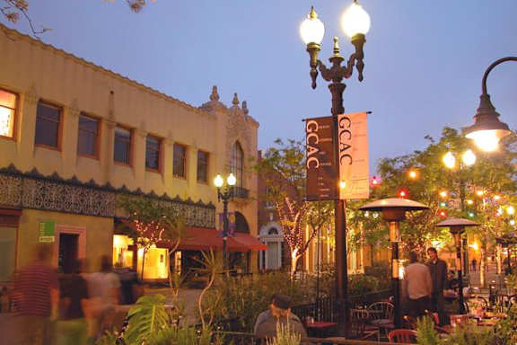 A street scene with a sign that says "GACAC".