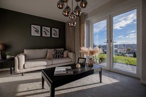 a living room with a couch and a table