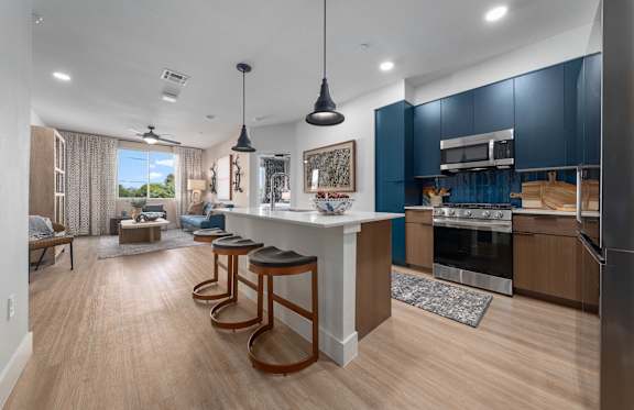 Aura Uptown Apartments in Phoenix, Arizona Lounge with Kitchen Rendering