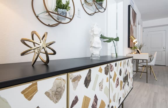 a kitchen and dining area in a 555 waverly unit