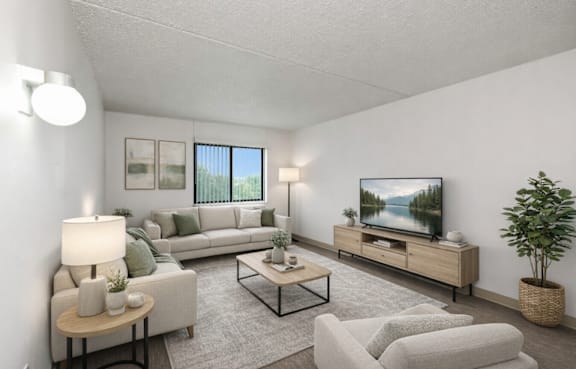 A living room with a grey chair and a wooden table.