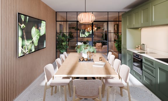 a kitchen and dining area with a table and chairs
