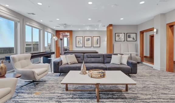 a living room with a couch and a table