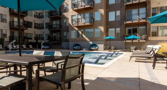 Outdoor Seating Surrounding Swimming Pool, Trifecta Belmar,  Lakewood, CO Luxury Apartments