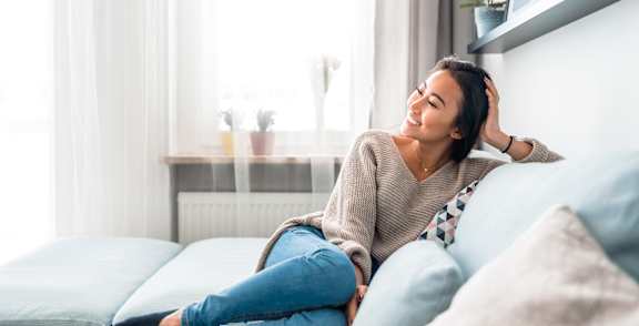 Woman Sitting on Couch at Artisan, Illinois