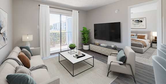 a living room with a fireplace and a sliding glass door
