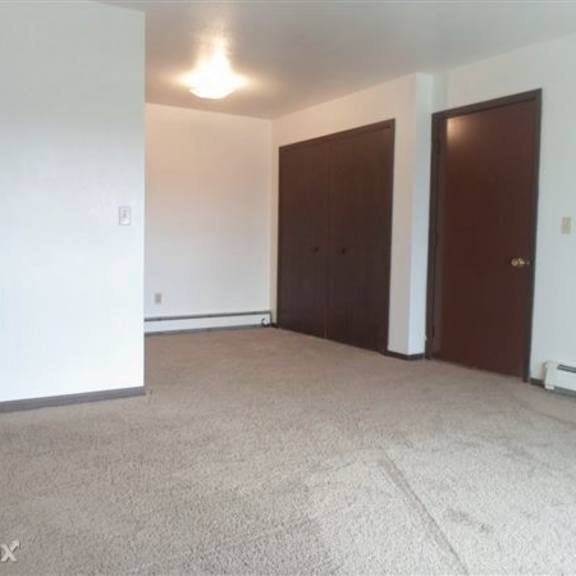 living room 120 vale street, cheboygan, mi 49721