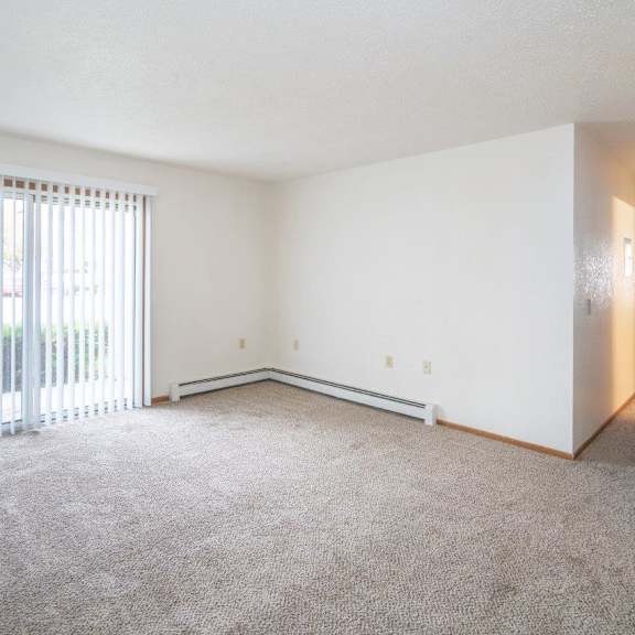 living room crawford apartments, 8640 independence ave, port austin, mi 48467