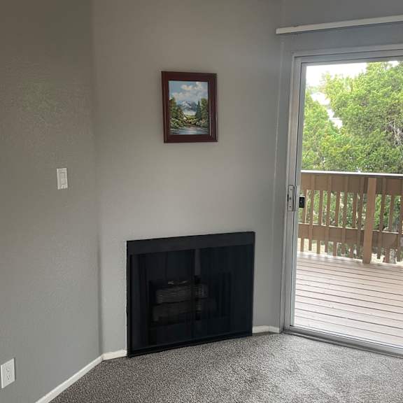 a picture frame is hanging on the wall in a room.
