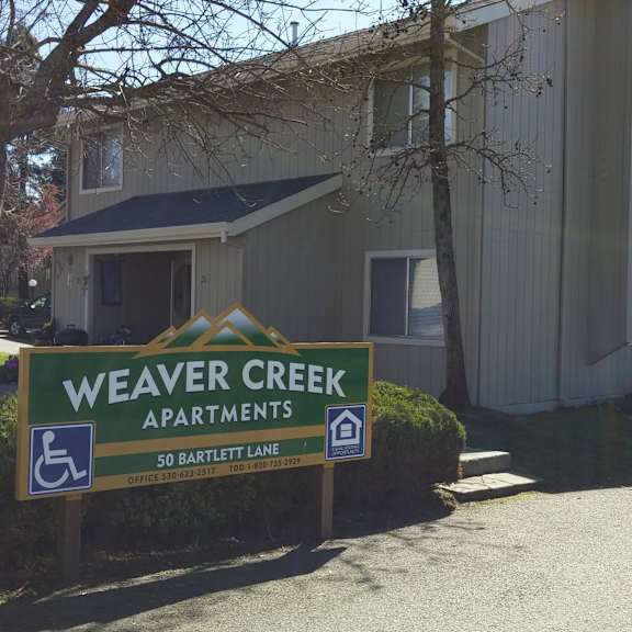 sign for weaver creek apts.