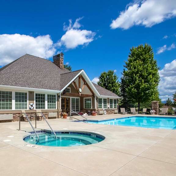 country vista at liberty lake with swimming pool with the clubhouse in the background