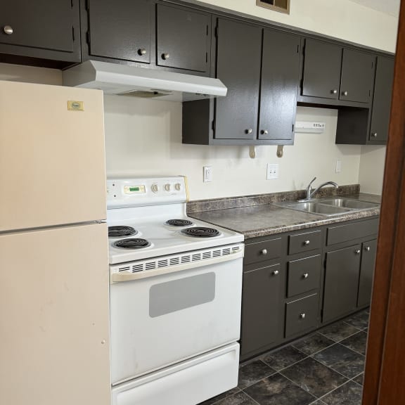 an overhead view of a kitchen with a bunch of appliances in it