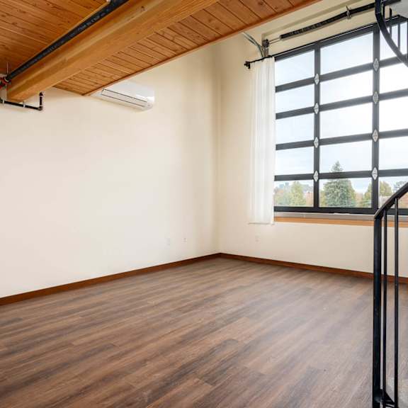 room with wooden floors at atomic orchard experiment, portland, or, 97232