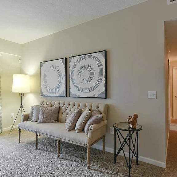 a living room with a couch and a table