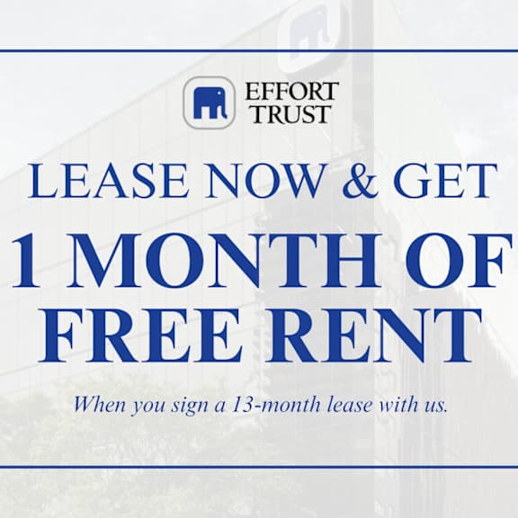 a sign advertising a free month of rent for signing a 13-month lease.