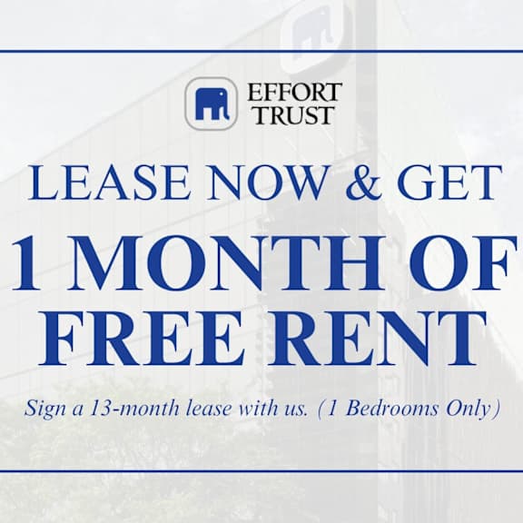 a sign advertising a free month of rent for signing a 13-month lease with effort trust.