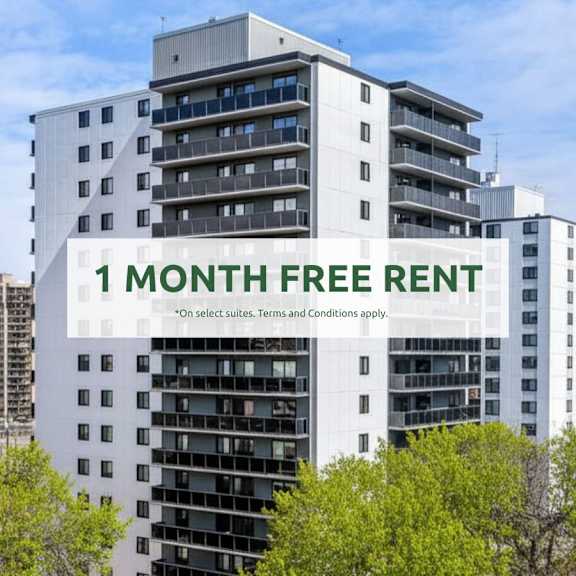 a tall white building with a sign that says "1 month free rent" in front of it.