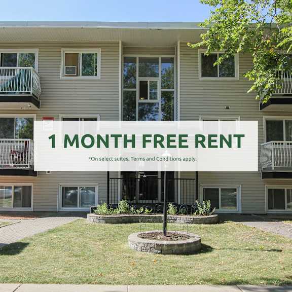 a building with a sign that says "1 month free rent" in front of it.