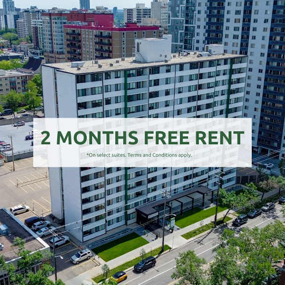 a large white building with the text "2 months free rent" in the foreground.