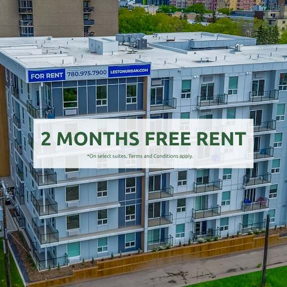 a modern apartment building offers a 2 months free rent promotion.