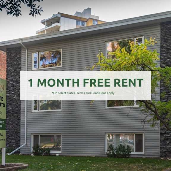 a sign advertises a 1 month free rent offer for westgate apartments.