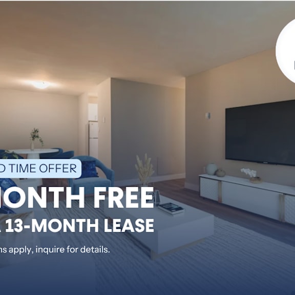 a living room with a television and a flat screen monitor on the wall.