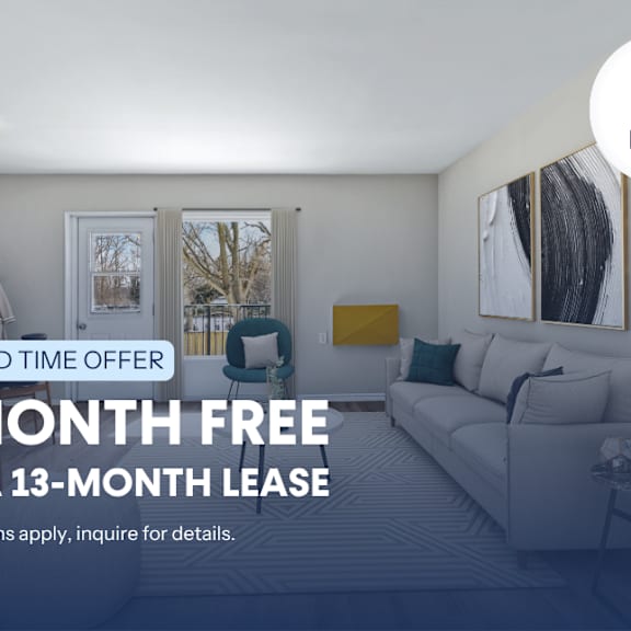 a room with a couch and a chair, advertising a free month on a lease.