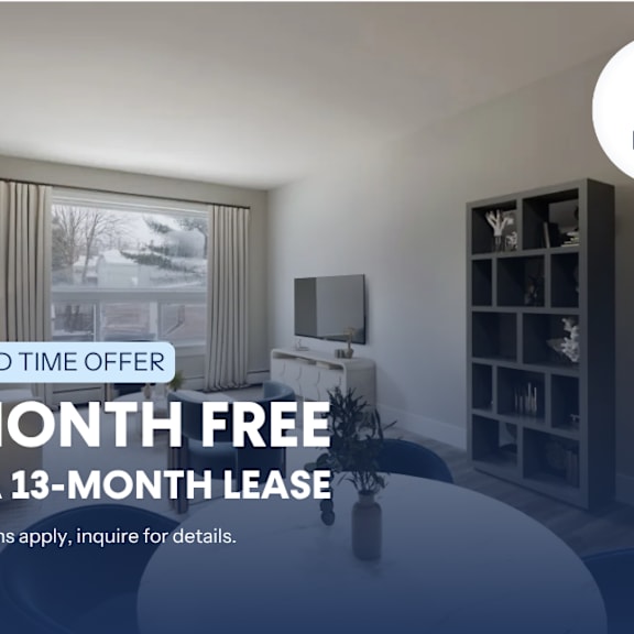 a room with a large window and a flat screen tv is on display for a limited time offer.