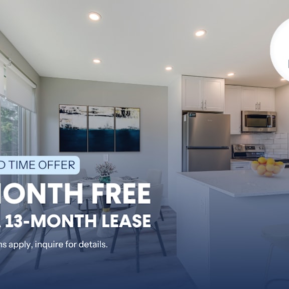 a kitchen interior with a sign offering a free month on a 13-month lease.