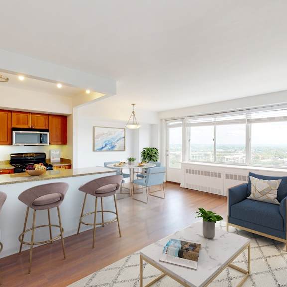 a living room with a bar area and a view of the city.