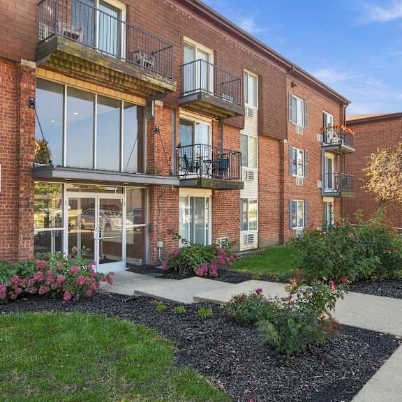 A brick building with the number 555 on it.