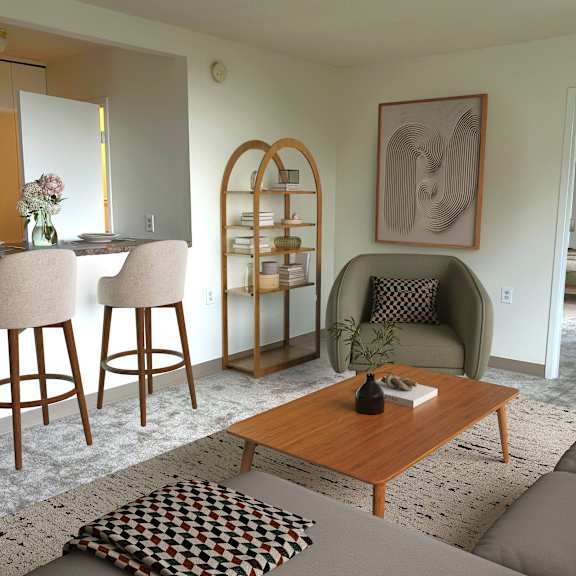 a living room with a brown wooden coffee table and a grey sofa.