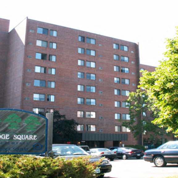 outside of building with bridge square sign