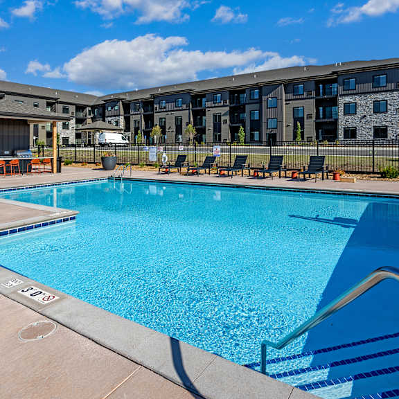our apartments have a resort style pool with lounge chairs