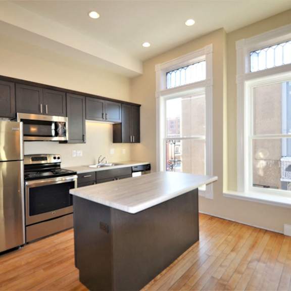 apartment 201 | 1 br | kitchen | stainless steel appliances |  three sixty real estate