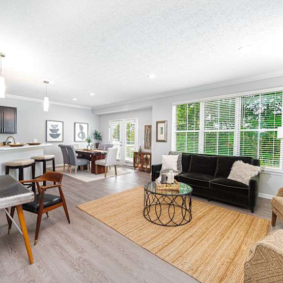 a living room with a couch and a table