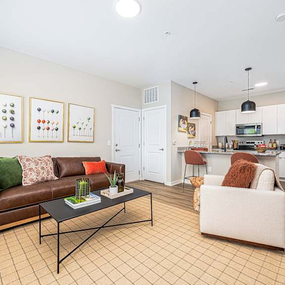 a living room with a couch and a table