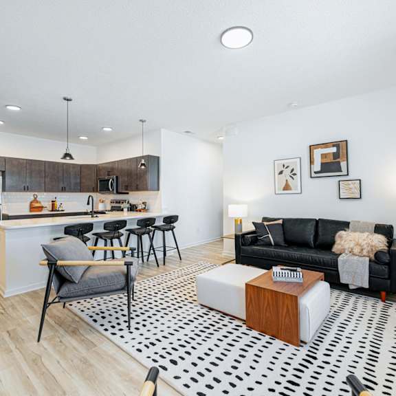 a living room with a couch and a table