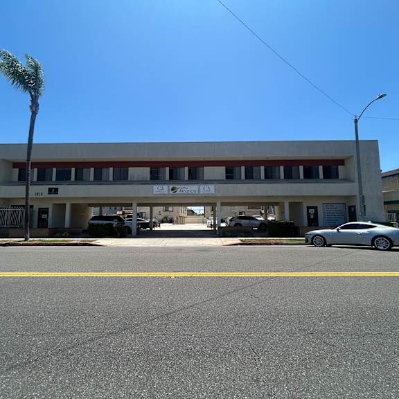 a building with a yellow line on the ground.