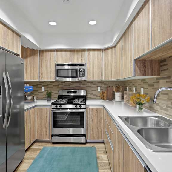 full-size kitchen with energy-efficient appliances and ample cabinet storage