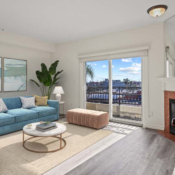 large-size living room with electric fireplace, vinyl flooring, and balcony