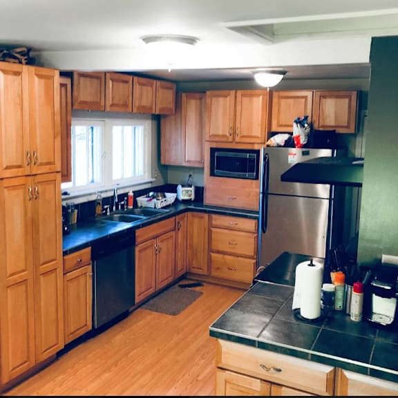 maple kitchen with granite countertops