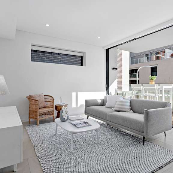 a living room with a couch and a coffee table