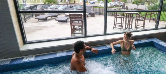 a group of people in a jacuzzi at Bluestone Lofts, Duluth, MN, 55803