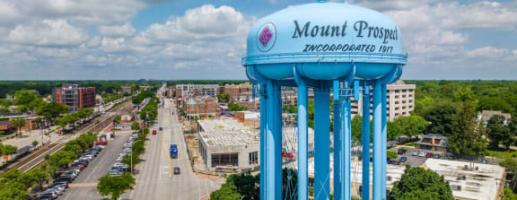 a water tower in the middle of a city