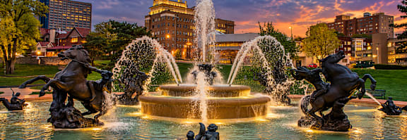 a fountain in the center of the park at Cambria Luxury Apartment Homes, Kansas City Missouri